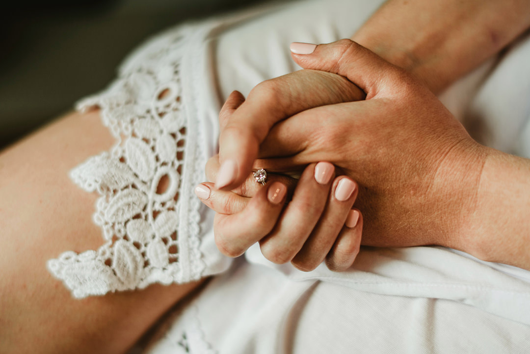 wedding rings on bride hand